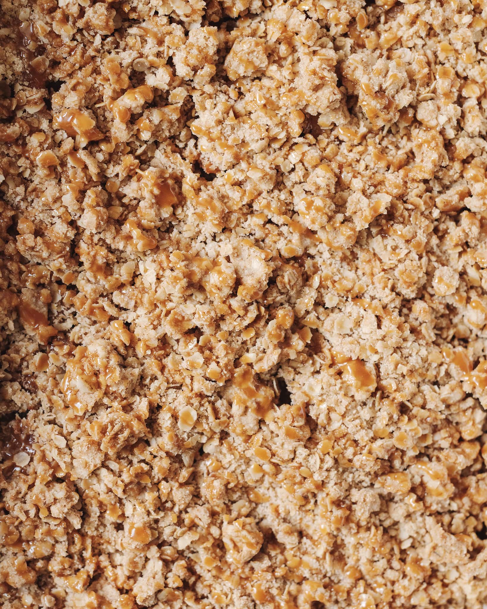 The oat crumble topping drizzled with caramel sauce