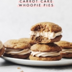 A carrot cake whoopie pie with a bite taken out of it with text overlay