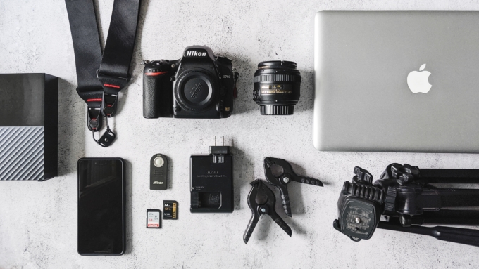 Flatlay of cameras and photography gear