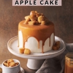 caramel apple cake with caramel drips on cake stand