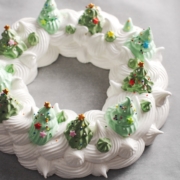 christmas pavlova wreath with green trees piped on top