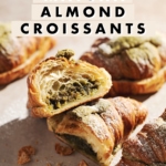 matcha almond croissant cut in half to show filling