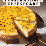 Slices of passionfruit cheesecake with text overlay that reads “tart & creamy passionfruit cheesecake”.