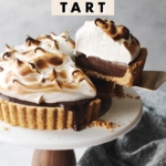 A slice of s’mores tart being lifted up with text overlay that says “no-bake s’mores tart”