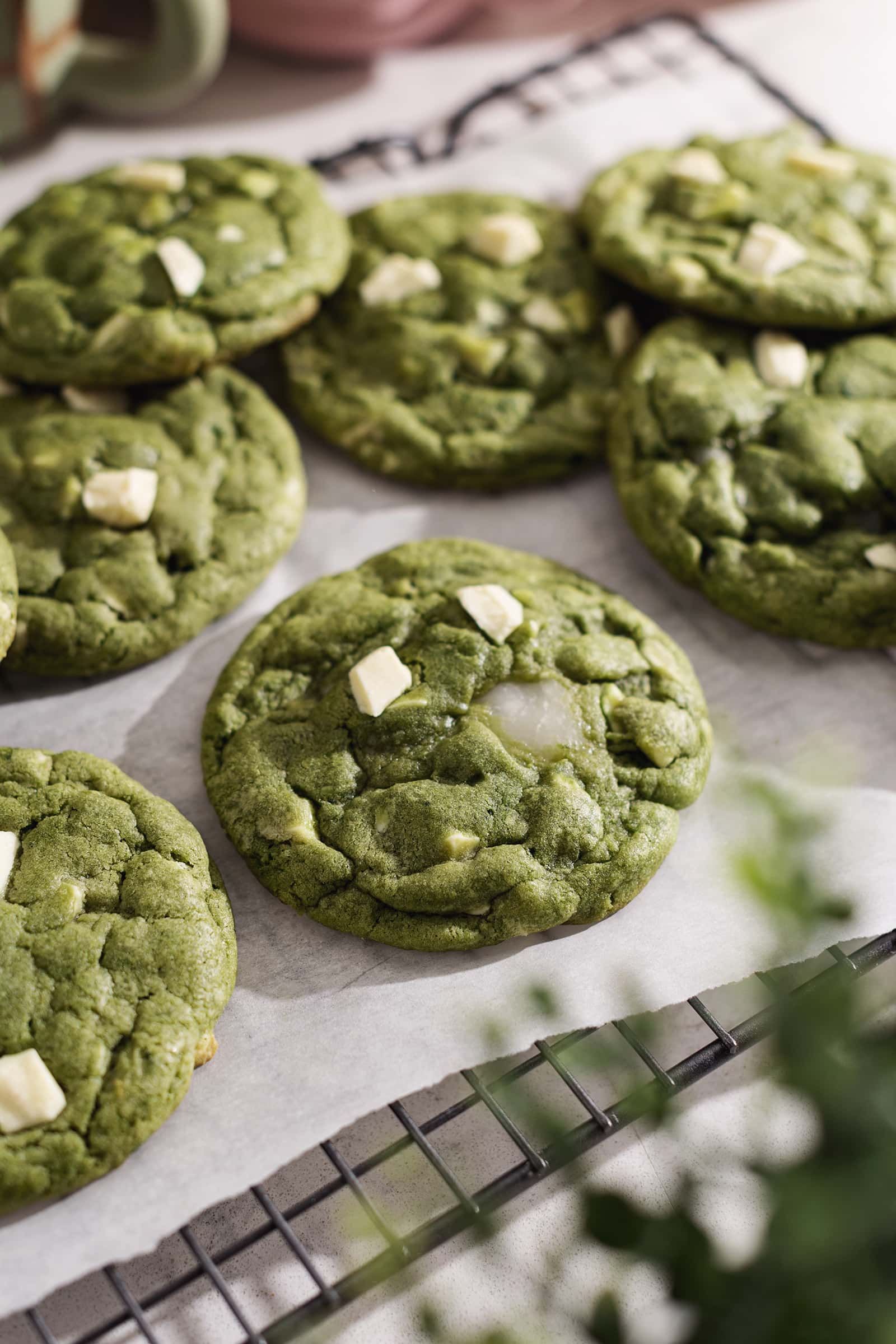 Matcha mochi cookies on a wire rack.