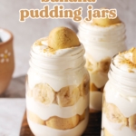 Glass jar showing layers of vanilla pudding, wafers, and banana slices.