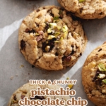 Chunky cookies scattered on parchment paper.