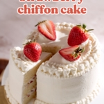 Strawberry chiffon cake with a slice cut out of it.