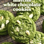 Matcha white chocolate cookies stacked on a wire rack.