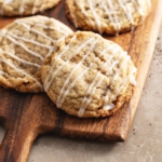Earl grey sugar cookies sitting on a wooden board.