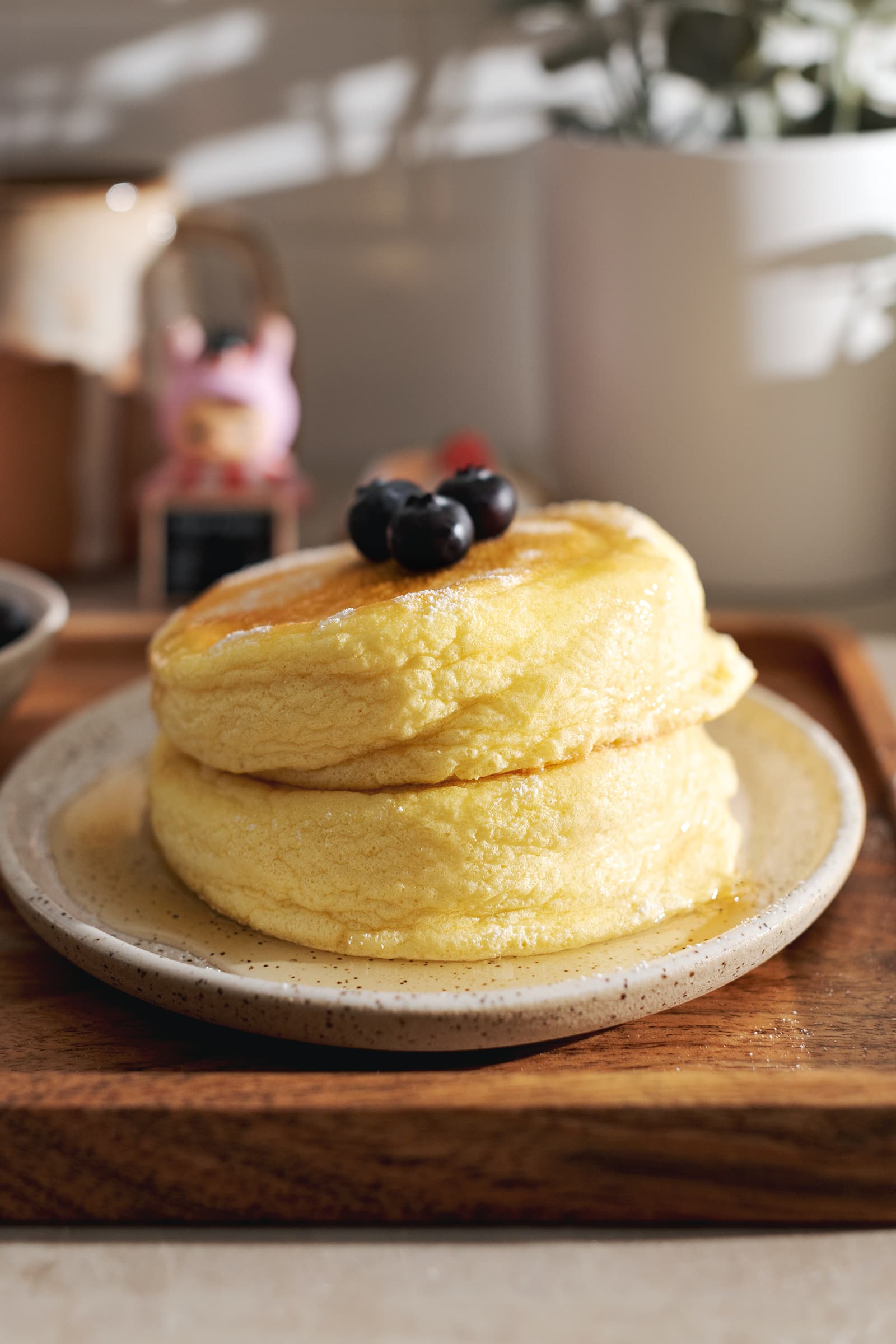 A stack of two Japanese souffle pancakes on a plate.