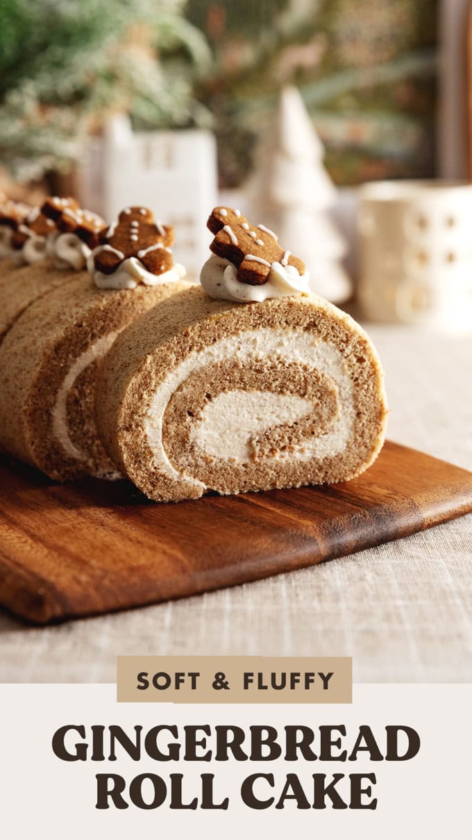 Slices of gingerbread roll cake lined up on a wooden board.